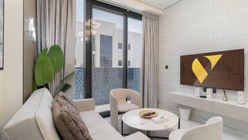 Deluxe Apartment, Balcony, City View | Living area