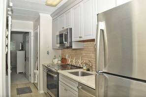 Fridge, microwave, oven, stovetop - Beautiful one Bedroom just steps to the beach with outdoor pool and closer to north park (Ocean City)