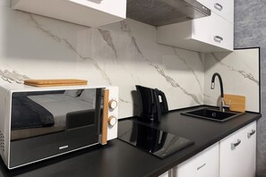 Apartamento clásico, baño privado | Cocina privada