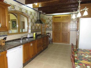 Fridge, cookware/dishes/utensils - Finca NA PONT- Finca rústica con gran piscina en Campos, Mallorca. Ideal famili by Interhome (Campos)