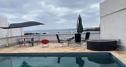 Waterfront second-floor apartment with pool