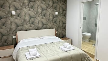Chambre Double Deluxe, salle de bains privée | Coffres-forts dans les chambres, bureau, Wi-Fi gratuit