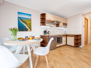 Fridge, oven, dishwasher, cookware/dishes/utensils - Wohnung in Darlowo mit Terrasse by Interhome (Darlowo)