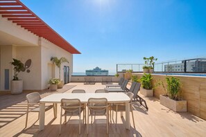 Outdoor dining - ®{Niza~City~Tower} @DowntownSD +Pool+Gym+Balcony (Santo Domingo)