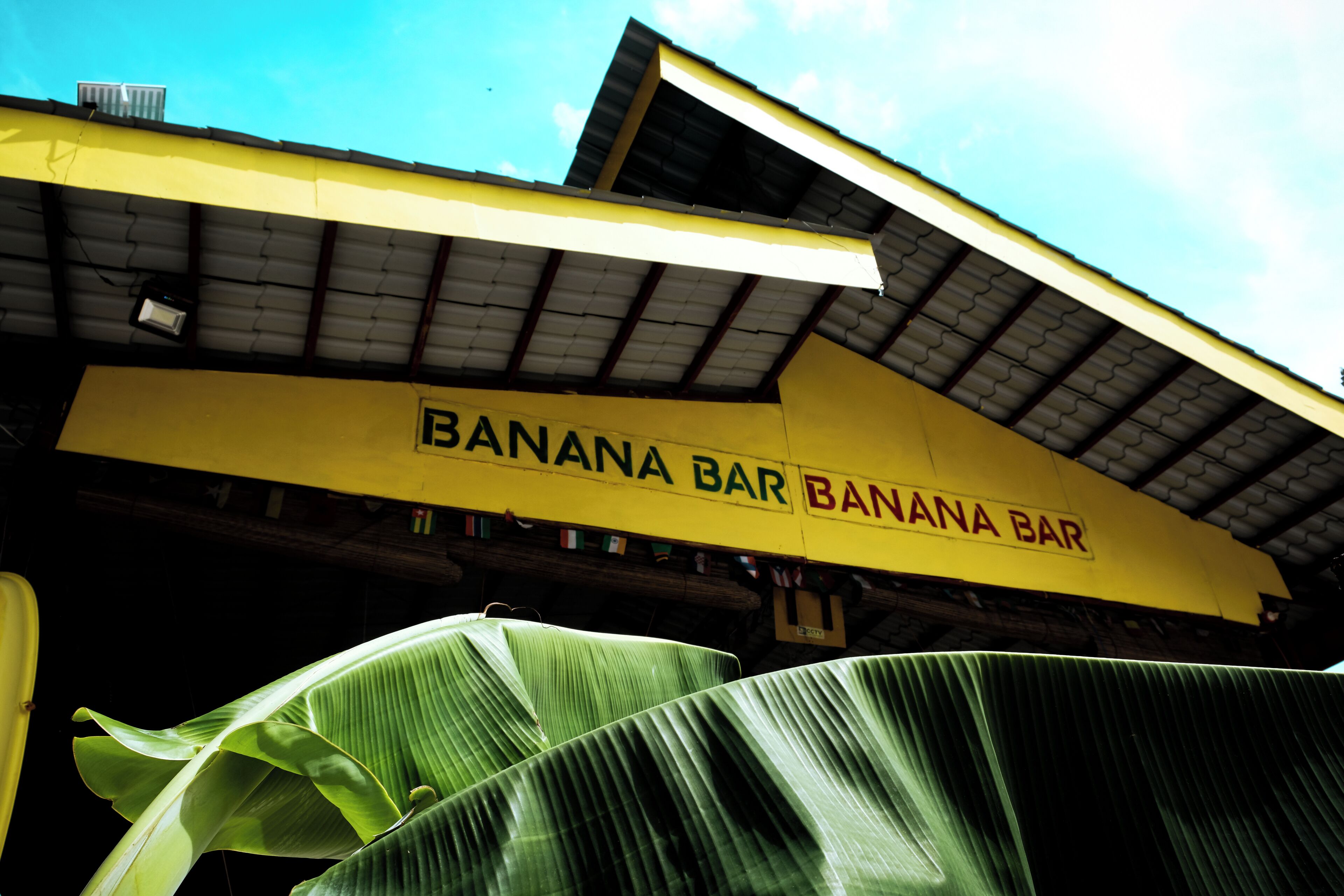 A building with a sign reading 'BANANA BAR.'