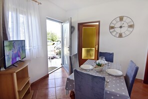 Apartment, 2 Bedrooms, Patio, Garden View | Dining room - Green Retreat Near the Coast (Umag)