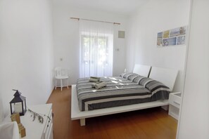 Apartamento, 2 quartos, varanda, vista para o jardim | 2 quartos