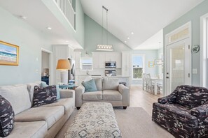 TV, books - Dockside Dreams: Beautiful Waterfront Home with Private Dock (Oak Island)