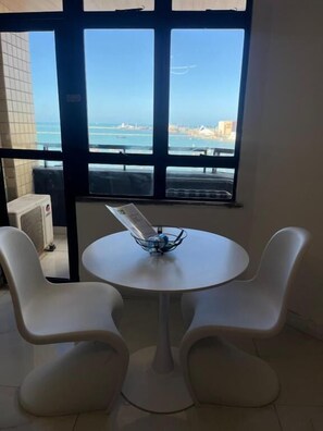 Apartment, Balcony, Ocean View | Dining - golden 952A (Fortaleza)