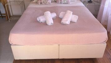 Double or Twin Room, Garden View | Bathroom | Slippers, towels, soap, shampoo