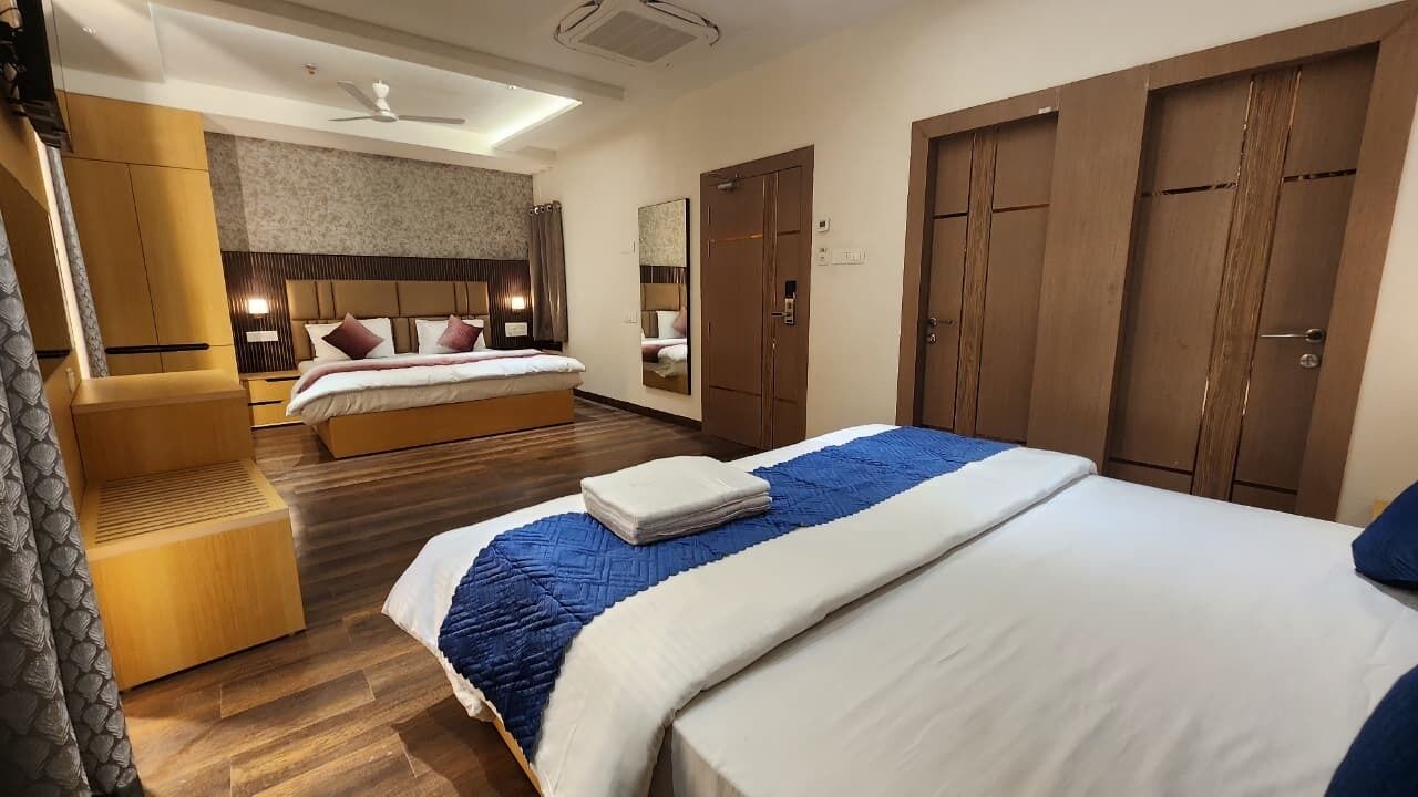 Family Room, Multiple Beds, Non Smoking, City View | In-room safe, desk, laptop workspace, soundproofing