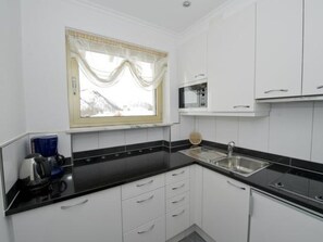 Fridge, microwave, dishwasher, cookware/dishes/utensils - Appartementhaus Cristal, (Samnaun-Dorf). by Interhome (Samnaun)