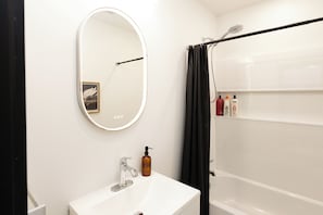Hair dryer, towels, soap, toilet paper