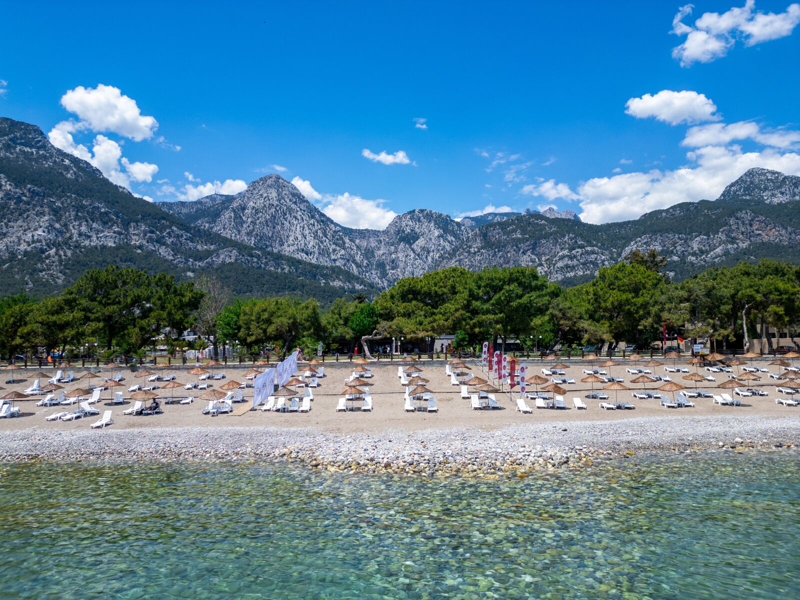 On the beach, sun loungers, beach umbrellas, beach towels