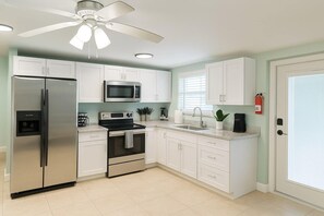 Fridge, microwave, oven, stovetop - Inviting 1BR Canal-Front Oasis APT 4 (Naples)