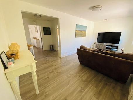 Living area. Cherry red door cottage with AC in cool Phoenix C