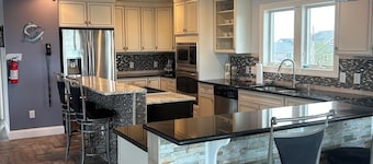 Waterfront 4-bdrm home with refuge views and dock on Mystic Island sleeps 9-10