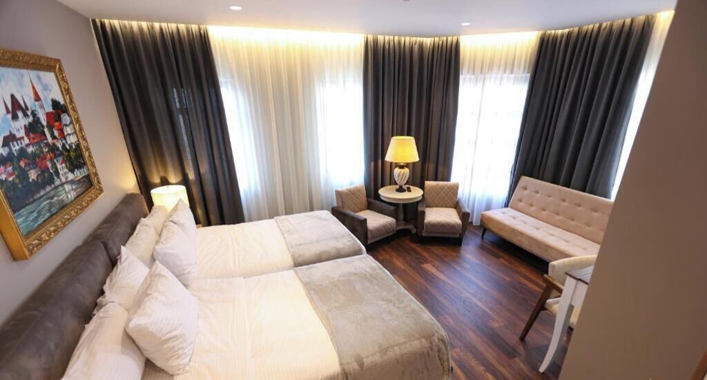 Deluxe Triple Room, Balcony, City View