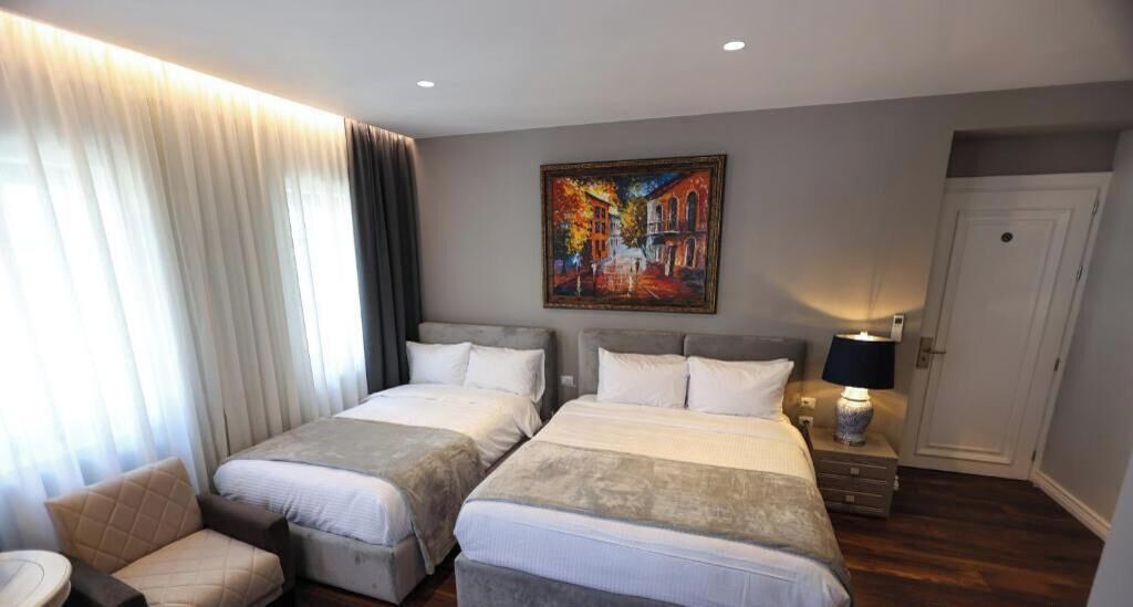 Luxury Quadruple Room, Balcony, City View