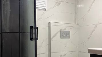Deluxe Apartment, Balcony, Sea View | Bathroom | Soap, toilet paper