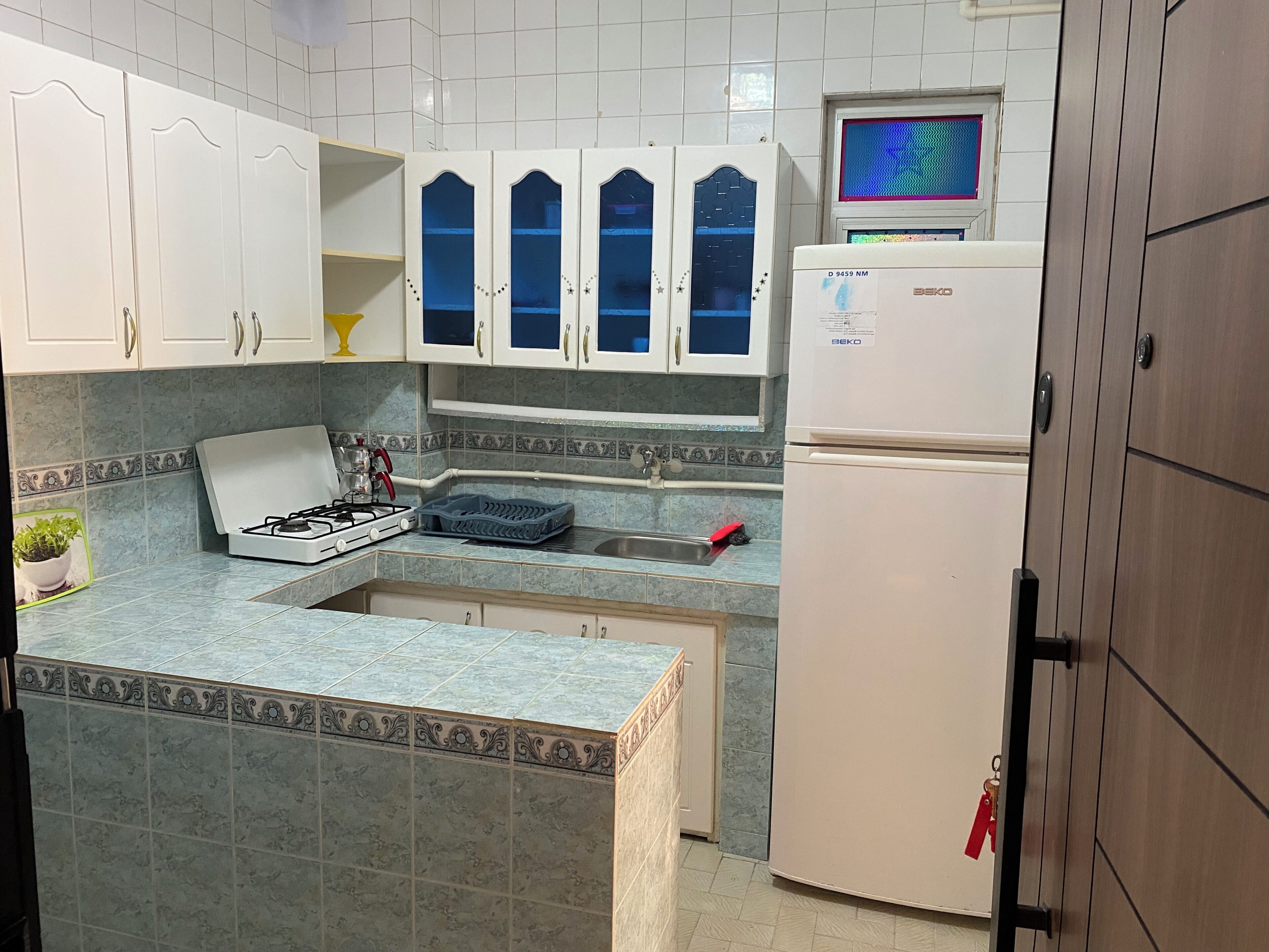Deluxe Condo, Sea View | Private kitchen | Full-size fridge, cleaning supplies