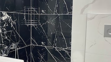 Deluxe Condo, Sea View | Bathroom | Soap, toilet paper