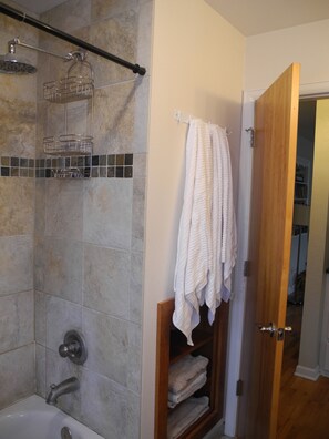 Shower, hair dryer, towels, soap