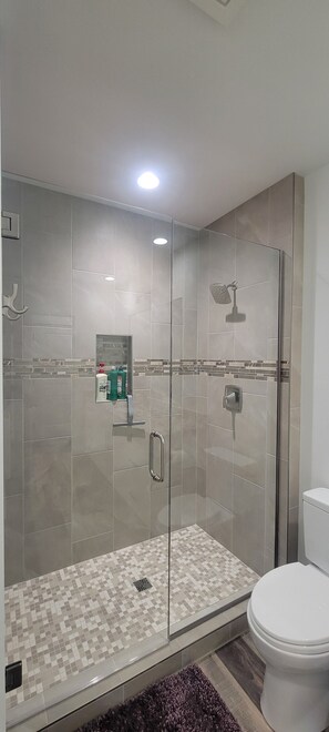 Shower, hair dryer, towels, soap