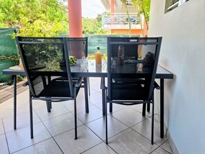 Outdoor dining - 2 bedroom apartment, Ti bamboo, anse à l'âne, residential pool (Les trois ilets)