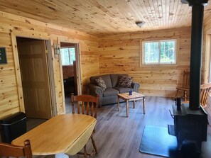 Living area - Off grid cottage in the woods. 
Peaceful,in nature, pet friendly.
no electricity (Middle River)