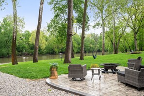 Outdoor dining - Riverfront Stay | Hot Tub, Secret Space, Pets OK! (Fishers)