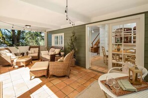 Outdoor dining - Peaceful 2-Acre Farmhouse Retreat, King Beds + Covered Porch + View (Arlington)