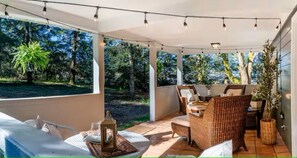 Outdoor dining - Peaceful 2-Acre Farmhouse Retreat, King Beds + Covered Porch + View (Arlington)