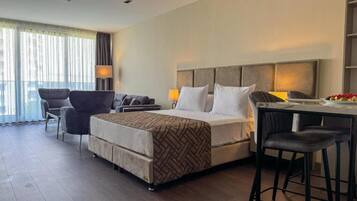 Deluxe Double Room, Balcony, City View | In-room safe, soundproofing, iron/ironing board, free WiFi