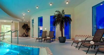 Hapimag Resort Flims, (Flims Waldhaus). Apartment mit 2 Schlafzimmern im Erdges by Interhome