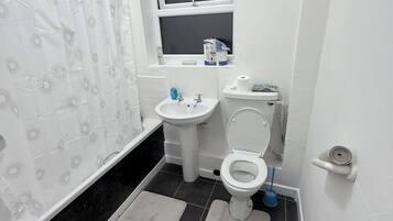 Hair dryer, towels, soap, toilet paper