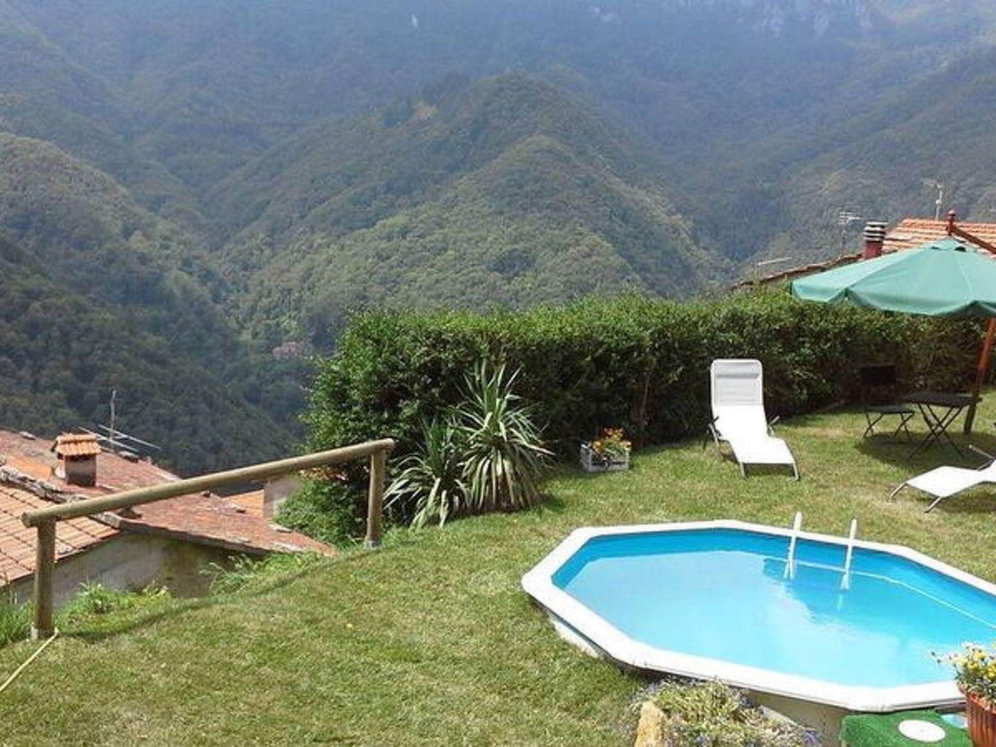 A pool with a view of a mountainous landscape.