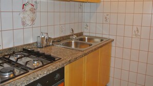 Fridge, cookware/dishes/utensils - Cristallo Residence mit Garten by Interhome (Lignano Pineta)