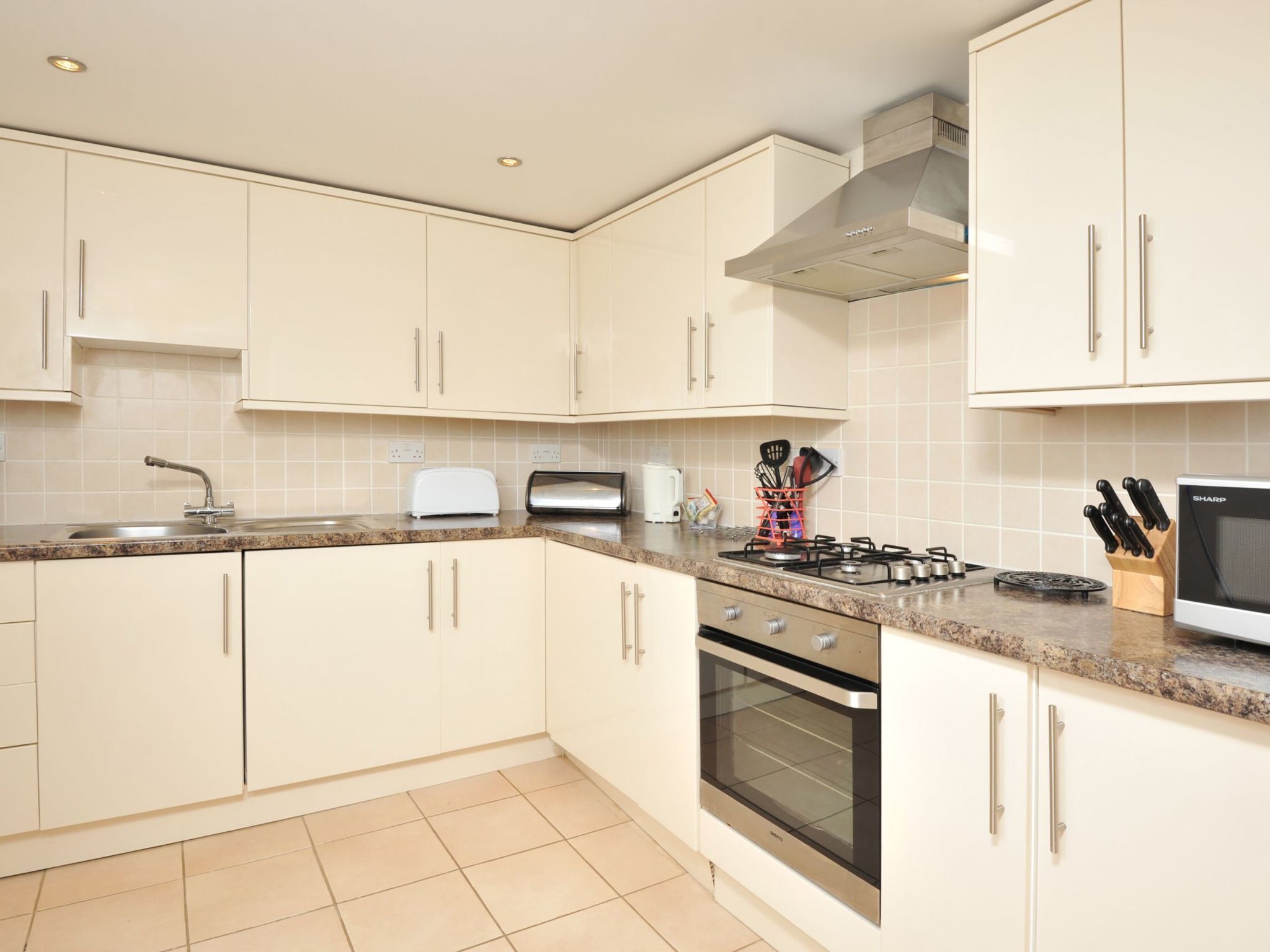 Fridge, microwave, oven, cookware/dishes/utensils