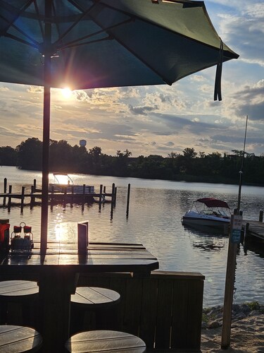 Waterfront Retreat home with Deck, Dock & Sunset Views. Your Marley Creek Escape
