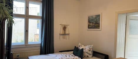 1 bedroom, desk, iron/ironing board, travel crib