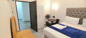 In-room safe, desk, laptop workspace, iron/ironing board - Neo & Ruks Guest House Boston.. (Cape Town)