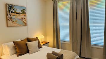 2 dormitorios, tabla de planchar con plancha, wifi y ropa de cama
