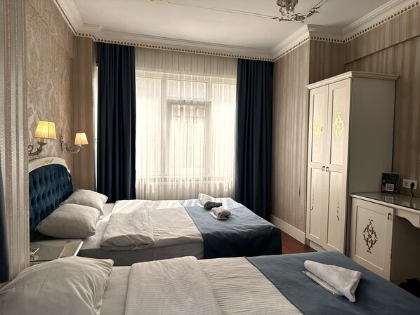 Doppel- oder Zweibettzimmer