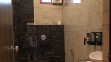 Shower, slippers, towels, soap