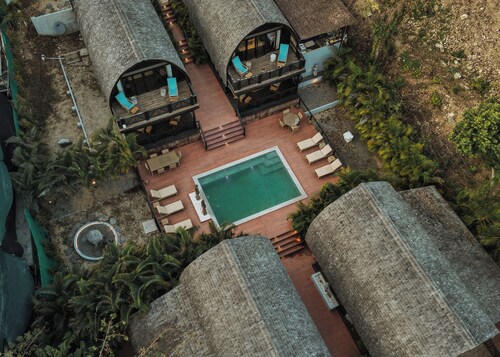 Balinese-inspired villas 🌴✨ private beach & endless ocean views 🌊
