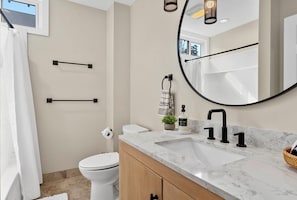Shower, hair dryer, bidet, towels