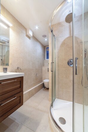 Shower, towels, soap, shampoo
