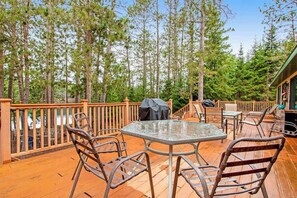 Outdoor dining - Waterfront, dog-friendly home with dock, kayaks, NEW hot tub, game room, & AC (Eagle River)