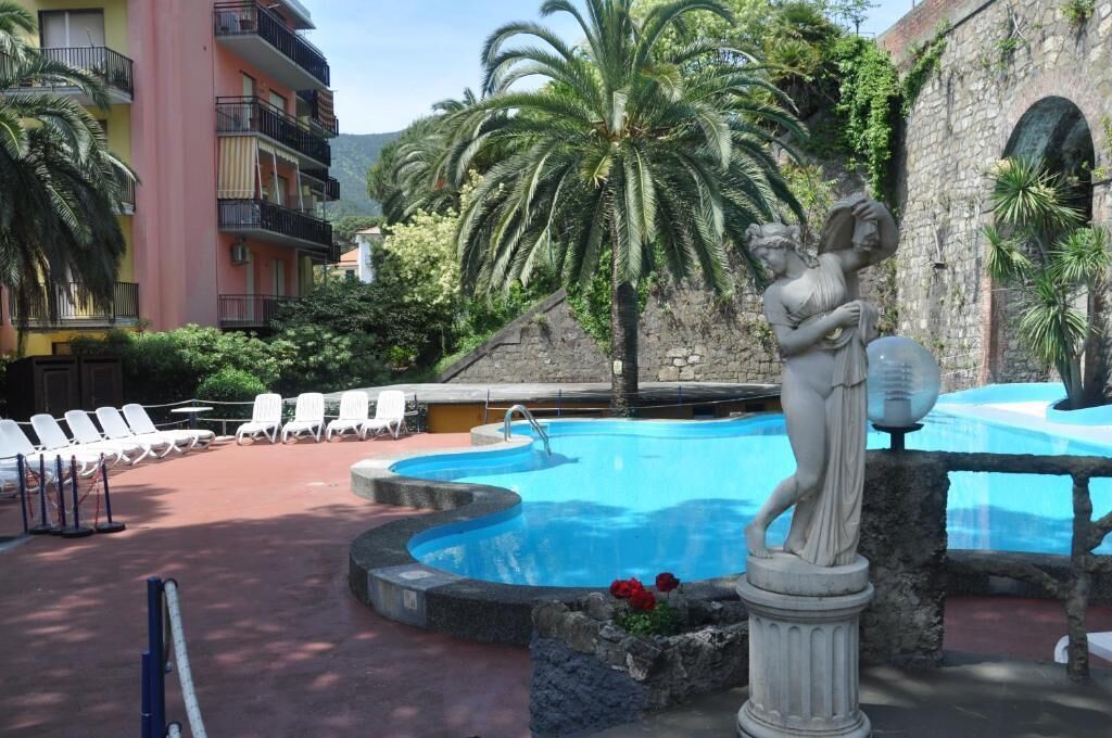 Seasonal outdoor pool, open 8:00 AM to 7:30 PM, sun loungers